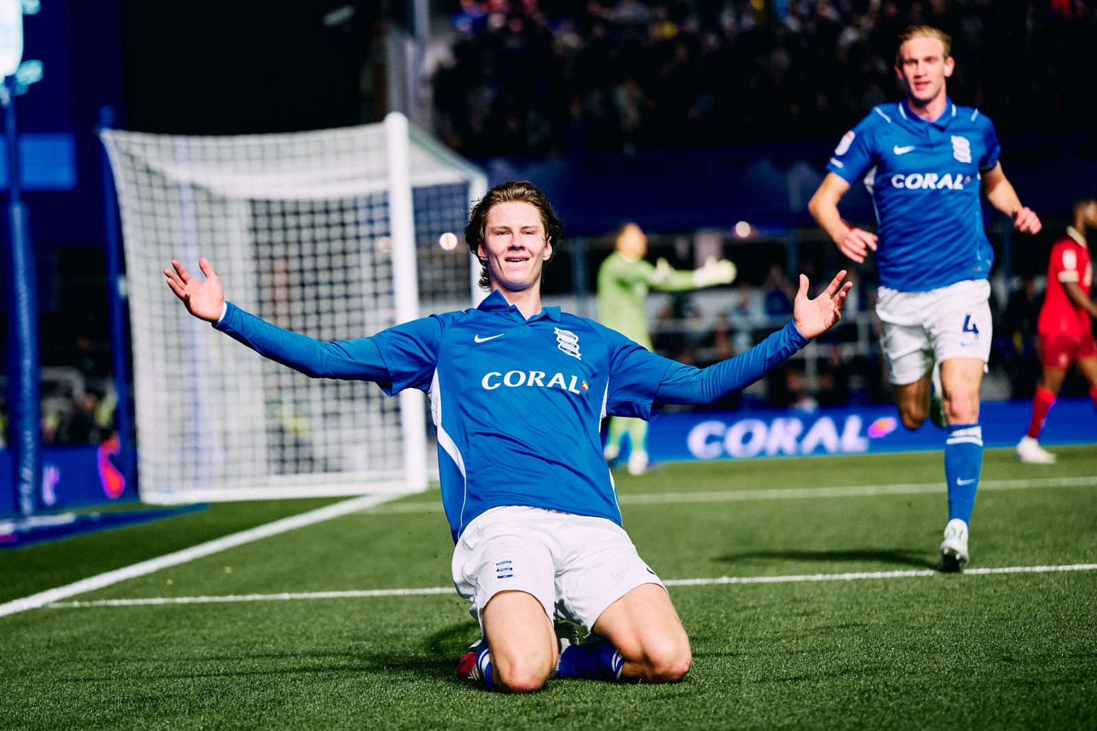 August Priske celebrates
